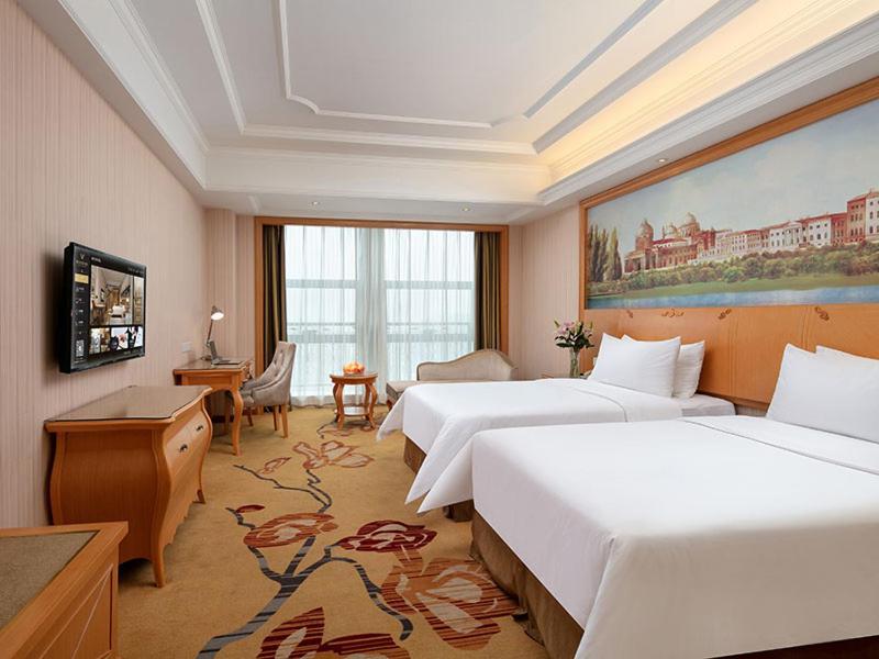 Vienna International Hotel Jiujiang Shili Street Экстерьер фото