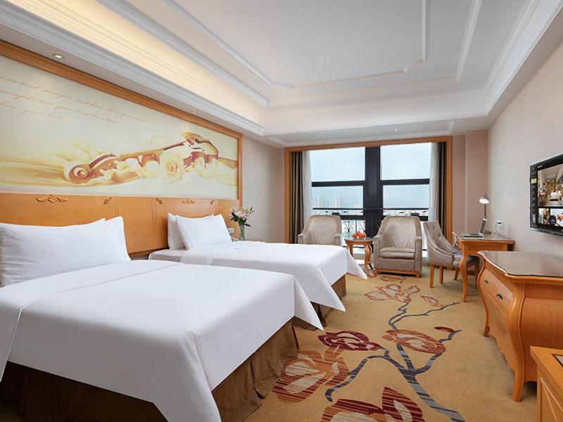 Vienna International Hotel Jiujiang Shili Street Экстерьер фото