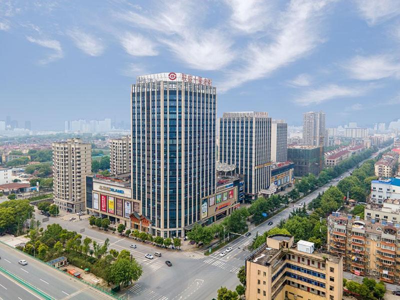 Vienna International Hotel Jiujiang Shili Street Экстерьер фото